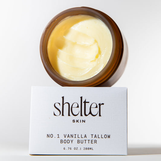 No.1 Vanilla Tallow Body Butter in a brown jar with a white label, creamy texture visible.