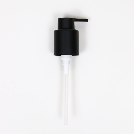 Oil pump in black with a clear dispensing tube for body oil applications.