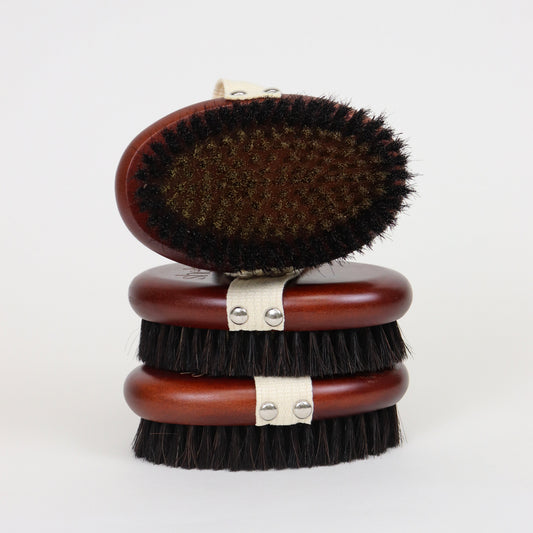 Sculpting Copper Dry Brush with wooden handle and natural bristles, stacked three high on a white background.